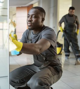 full-shot-men-cleaning-office